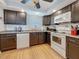Well-lit kitchen featuring ample counter space and modern appliances at 4725 Cove Circle # 908, St Petersburg, FL 33708