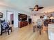 Spacious living room offers comfortable seating, open floor plan, and a large television at 4725 Cove Circle # 908, St Petersburg, FL 33708