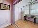 Office area featuring a modern desk, storage cabinets, and a window with a view at 4725 Cove Circle # 908, St Petersburg, FL 33708