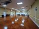 Expansive recreation room with polished concrete floors, perfect for hosting events and activities at 4725 Cove Circle # 908, St Petersburg, FL 33708