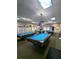 Spacious recreation room with multiple pool tables, offering a great space for entertainment at 4725 Cove Circle # 908, St Petersburg, FL 33708