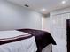 Spacious bedroom featuring ample closet space and a view to the entry way offering a welcoming atmosphere at 504 Riverside Dr # 504, Tarpon Springs, FL 34689