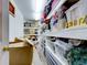 Well-organized storage with shelves, boxes, and decorations, maximizing space and functionality at 504 Riverside Dr # 504, Tarpon Springs, FL 34689