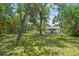 The home has a sprawling backyard with mature trees, offering a private and serene outdoor space at 601 75Th St N, St Petersburg, FL 33710
