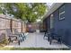 Charming backyard with ample seating space, a basketball hoop, and a privacy fence at 642 14Th S Ave, St Petersburg, FL 33701
