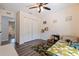 Bright bedroom featuring a large closet and hardwood-style floors, perfect for a room at 642 14Th S Ave, St Petersburg, FL 33701
