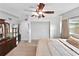Comfortable bedroom featuring a neutral color palette, dresser, and natural light at 6700 14Th N St, St Petersburg, FL 33702