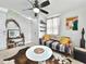 Stylish living room with a modern sofa, unique decor, and ample natural light at 6700 14Th N St, St Petersburg, FL 33702