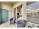 Cozy balcony featuring comfortable seating, ideal for enjoying morning coffee and relaxing outdoors at 746 Coral Reef Dr # 746, Tampa, FL 33602