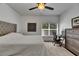 Bedroom boasts hardwood floors, ceiling fan, desk, and dresser at 746 Coral Reef Dr # 746, Tampa, FL 33602