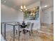 Dining area with chandelier and a view of the staircase and other rooms in the house at 746 Coral Reef Dr # 746, Tampa, FL 33602