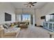Bright living room with view to a balcony and decoratively furnished at 746 Coral Reef Dr # 746, Tampa, FL 33602