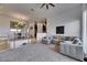 Open-concept living room and dining area with modern decor and great lighting at 746 Coral Reef Dr # 746, Tampa, FL 33602