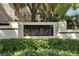 Elegant community sign reading 'Island Place Private Residences' surrounded by lush greenery at 746 Coral Reef Dr # 746, Tampa, FL 33602