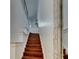 Stylish staircase with wooden steps and marble floors leading upstairs at 746 Coral Reef Dr # 746, Tampa, FL 33602
