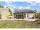Spacious brick patio with solar panels above, perfect for entertaining, offering plenty of space for outdoor enjoyment at 7833 Ontario Street Cir, Sarasota, FL 34243