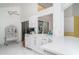 Bright kitchen with white countertops, stainless steel appliances, and ample cabinet space at 7833 Ontario Street Cir, Sarasota, FL 34243