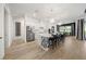 Bright, open kitchen with a large center island with bar stool seating and open layout at 7922 Lakes Edge Ln, Port Charlotte, FL 33981
