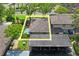 Aerial view showcases the property's layout with a private pool and designated parking spaces at 802 Antler Ct, Brandon, FL 33511