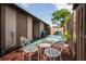 Cozy back patio with seating, perfect for outdoor relaxation and entertaining at 802 Antler Ct, Brandon, FL 33511