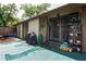 View of the back patio with plants and sliding door access to the interior at 802 Antler Ct, Brandon, FL 33511