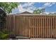 View of the wooden backyard fence providing privacy and security at 802 Antler Ct, Brandon, FL 33511