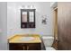 Bathroom featuring a vanity with storage, a toilet, and a shower with glass doors at 802 Antler Ct, Brandon, FL 33511