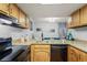Kitchen view with breakfast bar, stone counter tops, and pendant lighting at 802 Antler Ct, Brandon, FL 33511