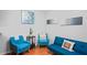 Comfortable sitting area with modern decor, accent chairs, and decorative pillows at 802 Antler Ct, Brandon, FL 33511