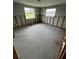 The bedroom has partially finished walls and tiled flooring at 802 White Heron Blvd, Ruskin, FL 33570