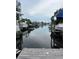 Scenic waterfront view showcasing boats and private docks along a calm canal at 802 White Heron Blvd, Ruskin, FL 33570