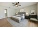 Serene bedroom with a plush bed, stylish decor, and ample space for relaxation at 8630 134Th St, Seminole, FL 33776