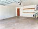 Spacious two car garage with open ceiling, ample space, and available storage at 8630 134Th St, Seminole, FL 33776
