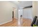 Open bedroom showing a closet and doorway to the bathroom, hardwood floors, bright lighting at 918 27Th N St, St Petersburg, FL 33713
