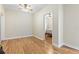 Bright bedroom featuring gleaming hardwood floors and a ceiling fan for comfort at 918 27Th N St, St Petersburg, FL 33713