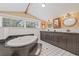 Bathroom features a soaking tub, dual sinks, and granite countertops at 1005 Main St, Safety Harbor, FL 34695