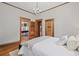 Bedroom showing wood trim, doors, and ceiling at 1005 Main St, Safety Harbor, FL 34695