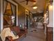 Inviting front porch with rocking chairs, a bench, and cozy decor, perfect for relaxing evenings at 1005 Main St, Safety Harbor, FL 34695