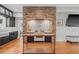 Rustic-style kitchen with brick hearth, central island, and stainless steel appliances at 1005 Main St, Safety Harbor, FL 34695