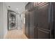 Laundry room features a stacked washer/dryer, and a glass enclosed shower at 1005 Main St, Safety Harbor, FL 34695