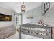 Charming bedroom with bunk beds, soft gray color, and decorative accents at 10112 Downey Ln, Tampa, FL 33626