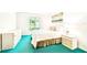 Bright bedroom with a queen-sized bed, a window providing natural light, and a serene decor at 1109 Pine Ridge W Cir # C1, Tarpon Springs, FL 34688