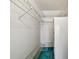 Spacious walk-in closet with wire shelving for organized storage at 1109 Pine Ridge W Cir # C1, Tarpon Springs, FL 34688