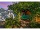 Backyard features brick walkway, privacy fence and covered bench seat at 11125 117Th St, Seminole, FL 33778