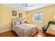 Comfortable bedroom with hardwood floors, a ceiling fan, and lots of natural light at 11125 117Th St, Seminole, FL 33778