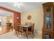 Charming dining room with a unique tile table, complemented by views into the living areas at 11125 117Th St, Seminole, FL 33778