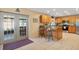 Bright eat-in kitchen with modern appliances, a granite island, and access to the patio at 11125 117Th St, Seminole, FL 33778