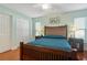 Bright bedroom features hardwood floors, a large closet, and ample natural light at 11125 117Th St, Seminole, FL 33778