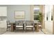 Elegant dining room with a contemporary table and stylish accents at 11515 E 69Th Pl, Palmetto, FL 34221