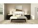 Serene bedroom with a large bed, nightstands, lamps, and a window providing natural light at 11515 E 69Th Pl, Palmetto, FL 34221
